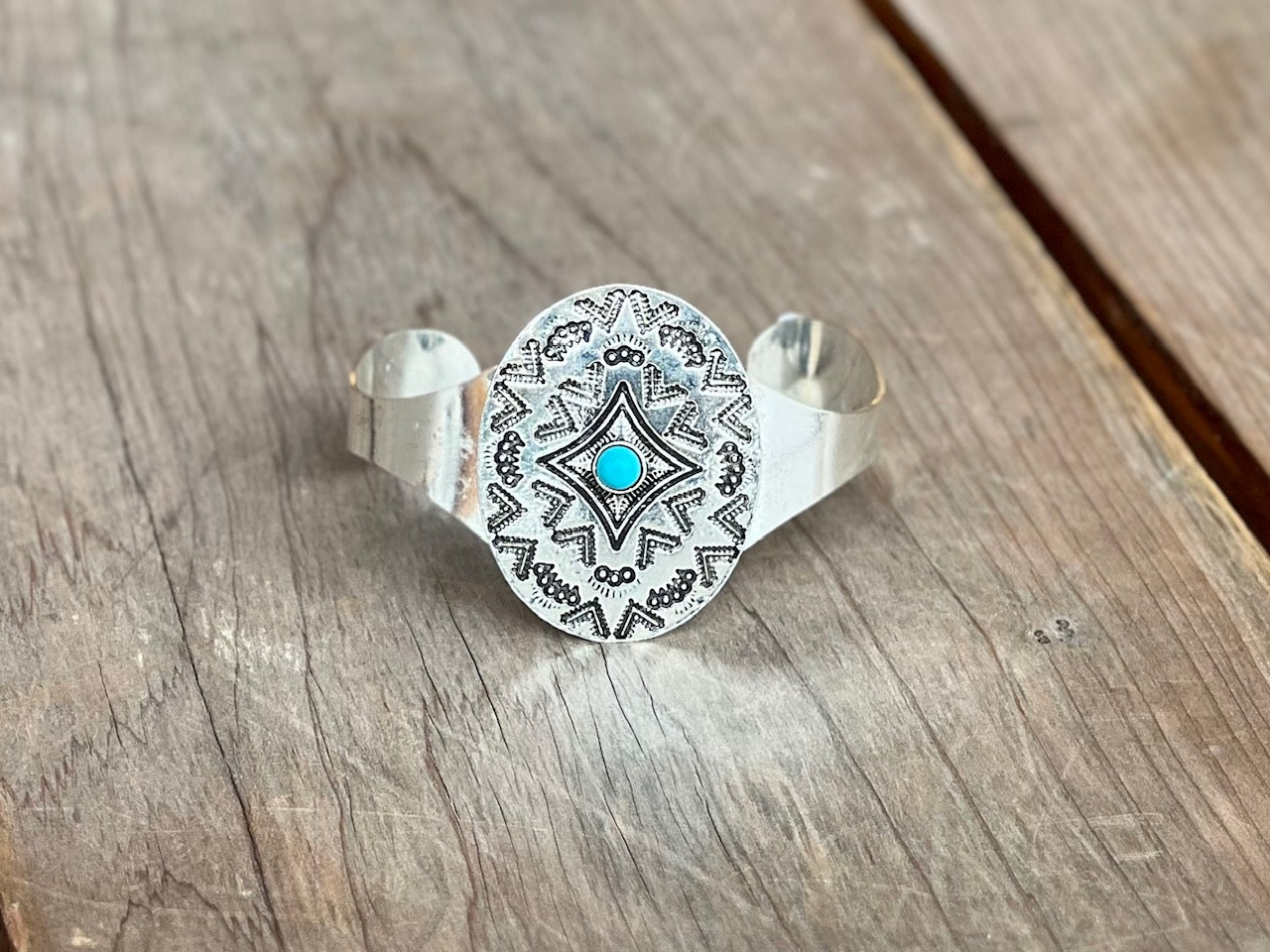 Stamped Silver cuff with Turquoise stone accent