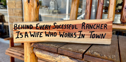 "Behind Every Rancher..." Sign