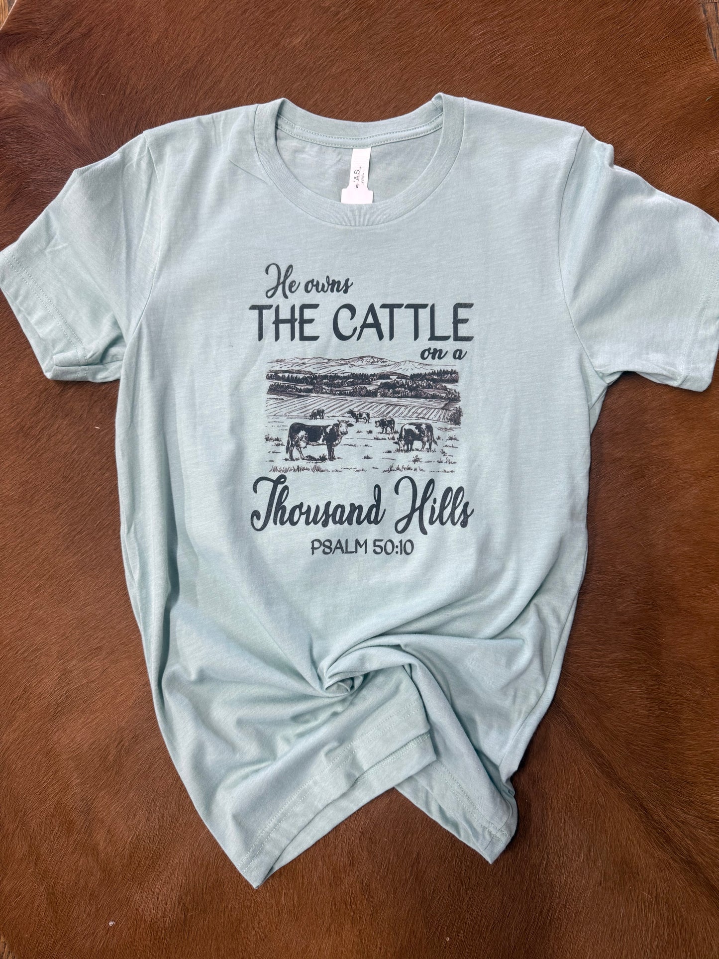 He Owns the Cattle on  Thousand Hills Graphic Tee